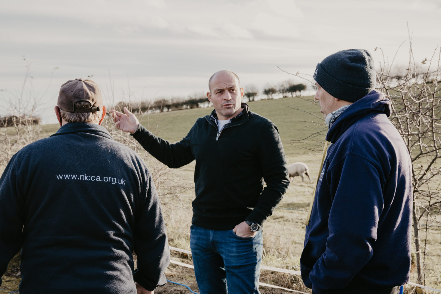 Rory Best with two young adults