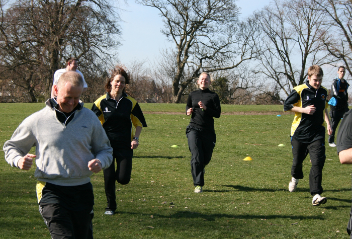 people running on a field