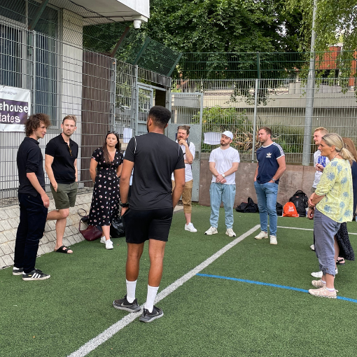 Group of adults on a sport pitch